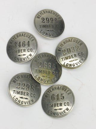 Item #5447 Weyerhaeuser Timber Co. Longview Numbered Employee Identification Badges [Lot of six]....