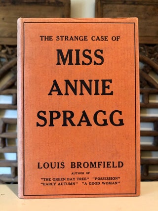 Item #5633 The Strange Case of Miss Annie Spragg [dust jacket title continues:] A Holiday in...