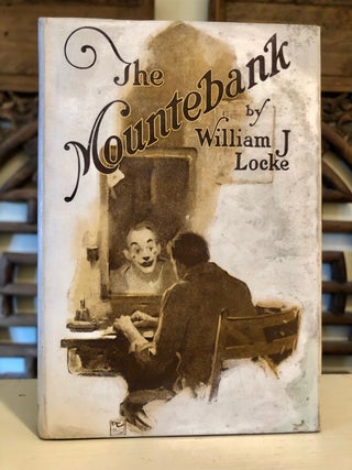 Item #6005 The Mountebank - First Edition with Dust Jacket. William J. LOCKE